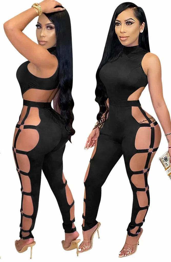 Woman in black cutout jumpsuit with high neck and side open straps, wearing high heels