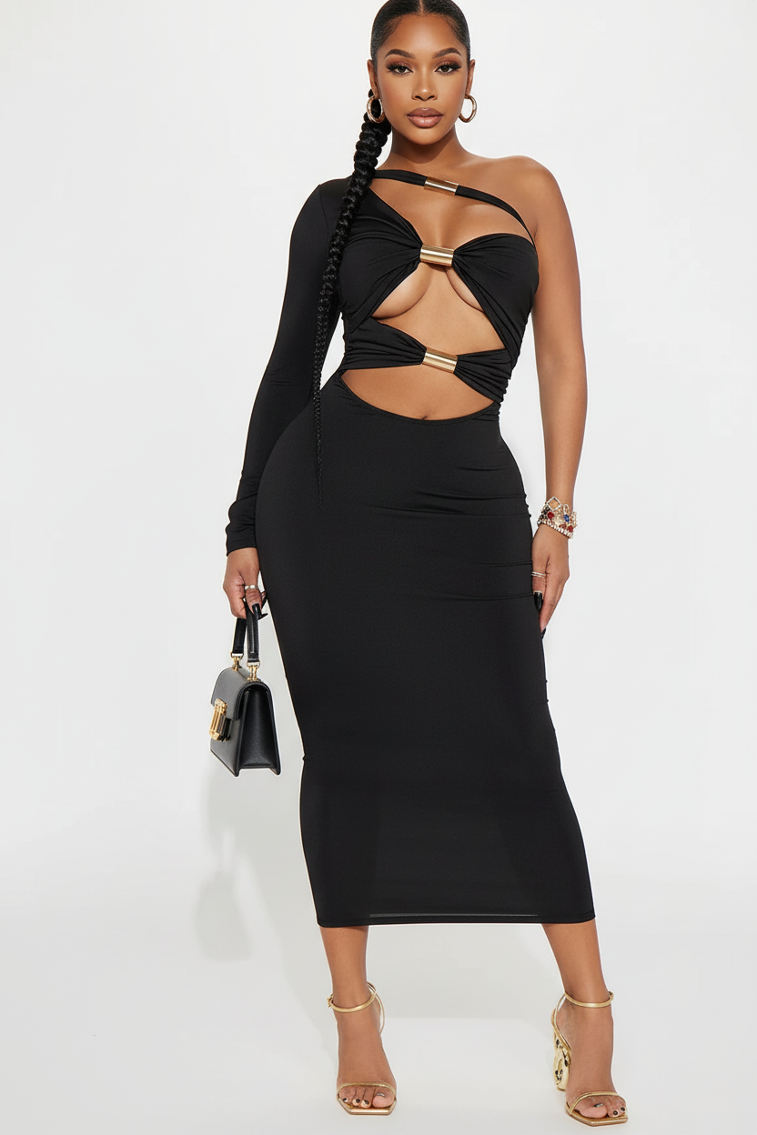 Model in black cutout dress with statement jewelry